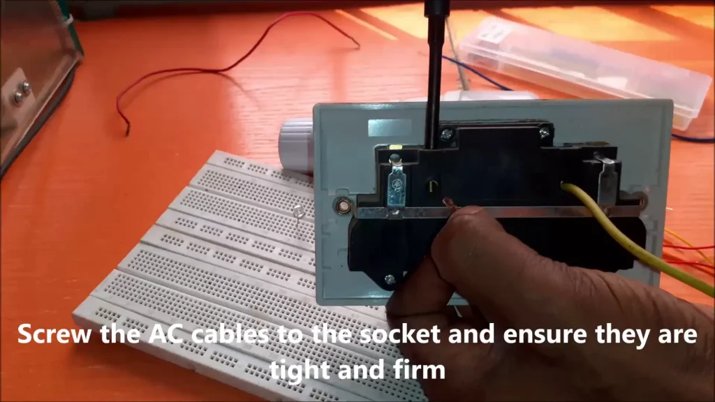 connect the AC wire terminals to the lamp holder