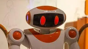 Can a robot's speech capabilities influence how much people trust it?