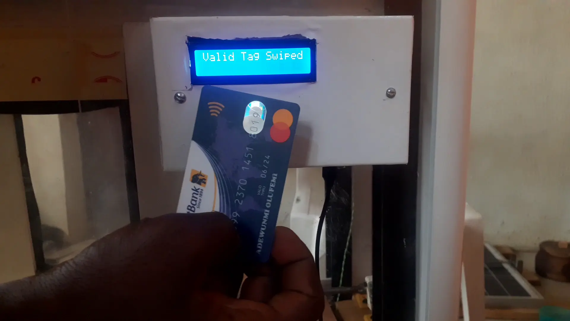 RFID-based access control with disinfectant booth: access granted