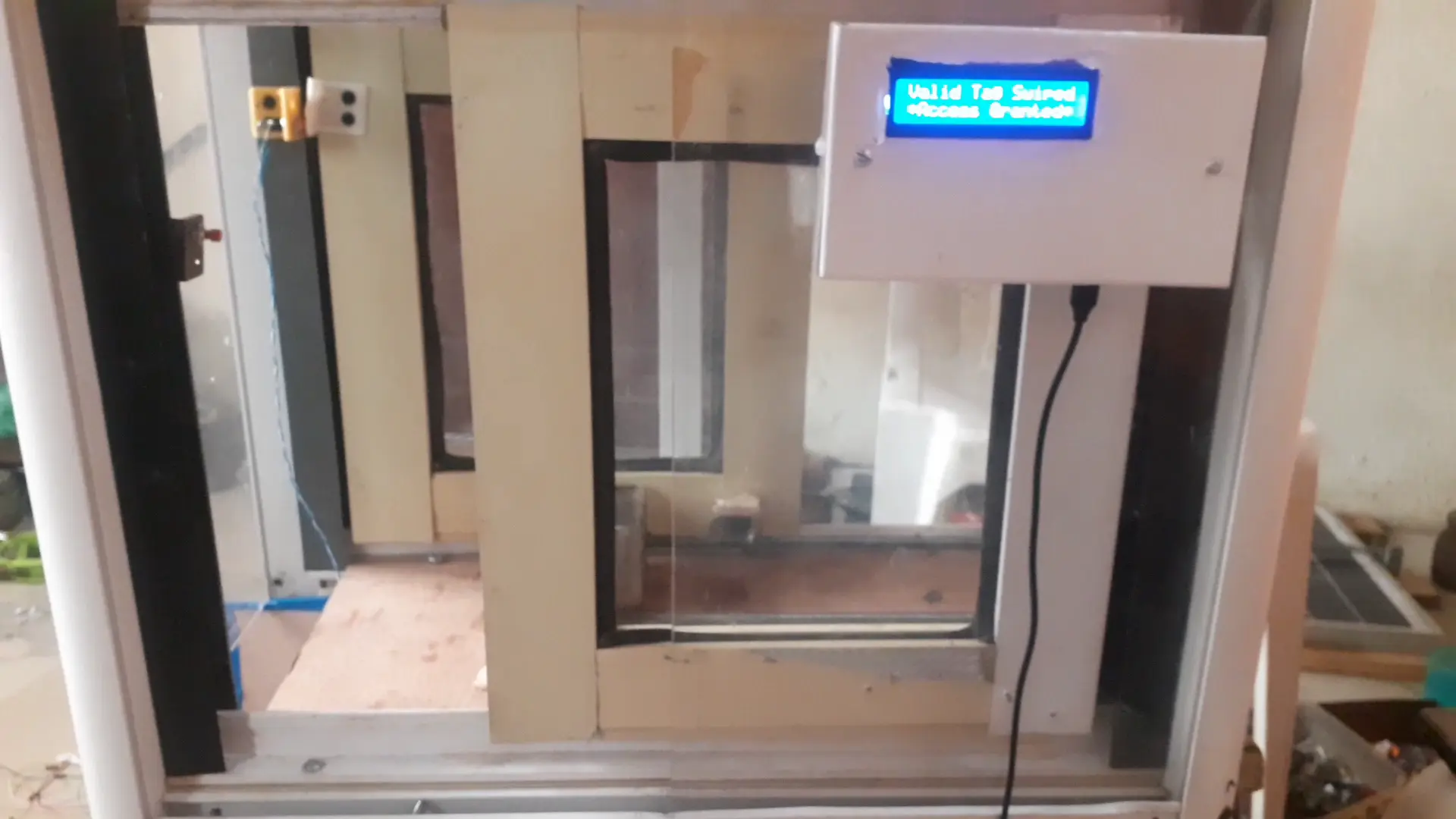 RFID-based access control with disinfectant booth: opening the access granted door
