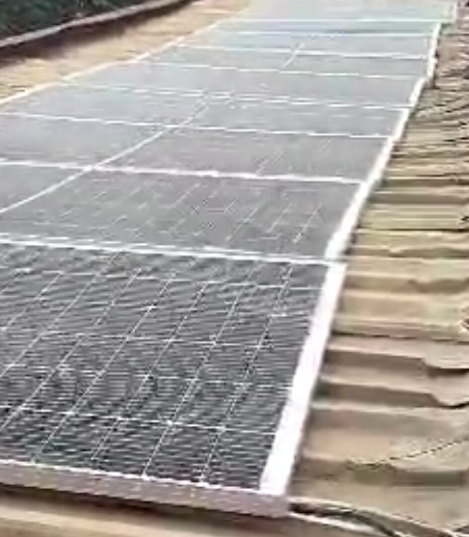 solar inverter installation: The solar panels being mounted on the roof